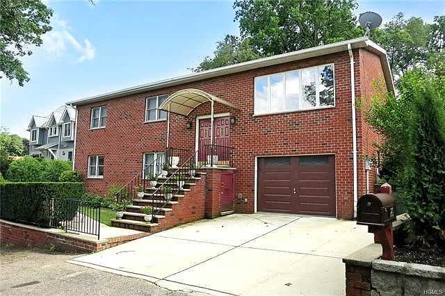 Step into this all brick home ....