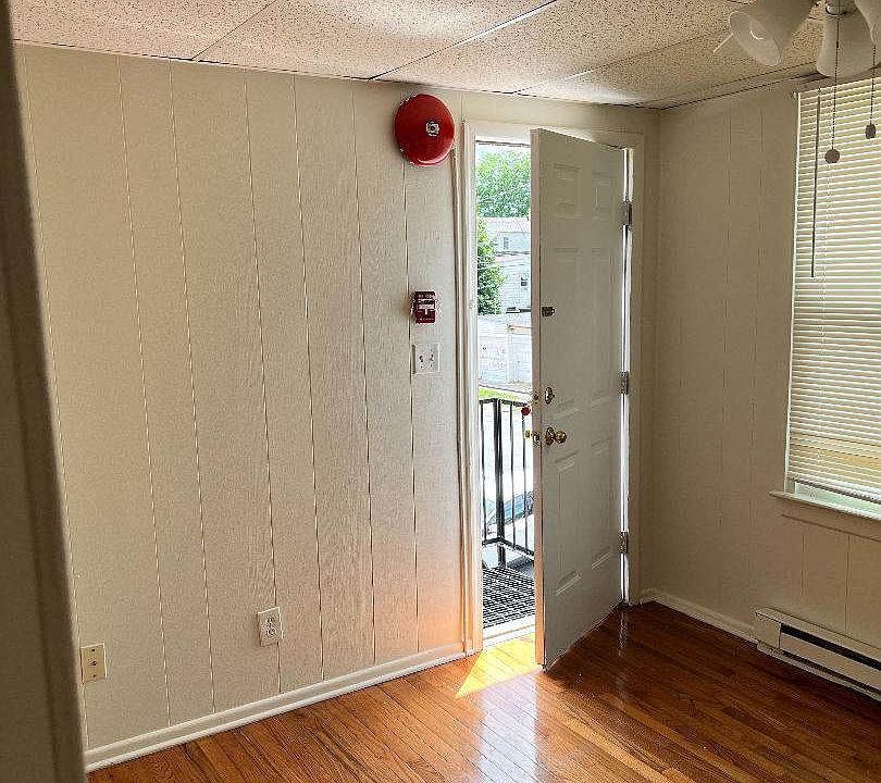 Living Room with Hardwood Floors and Ceiling Fan