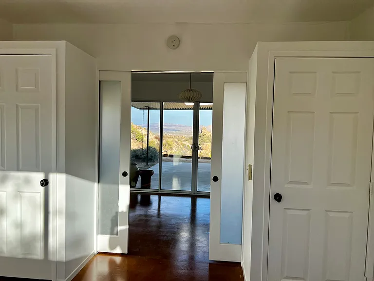 Closets in the bedroom off the dining area