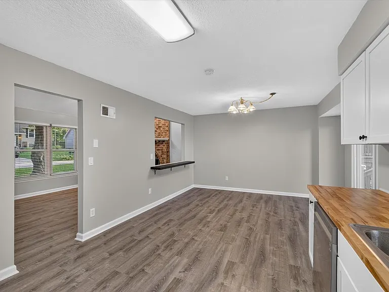 Eat-in Kitchen with new flooring, cabinets and appliances