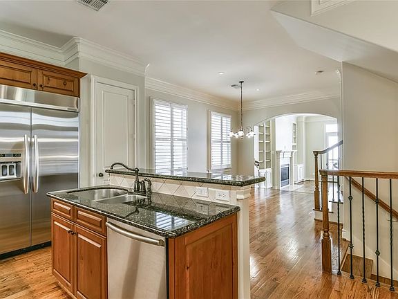 Spacious and open second floor living and dining with view from the kitchen.