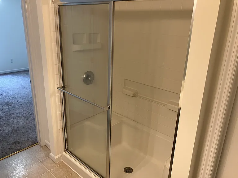 Master bathroom offers a shower only.