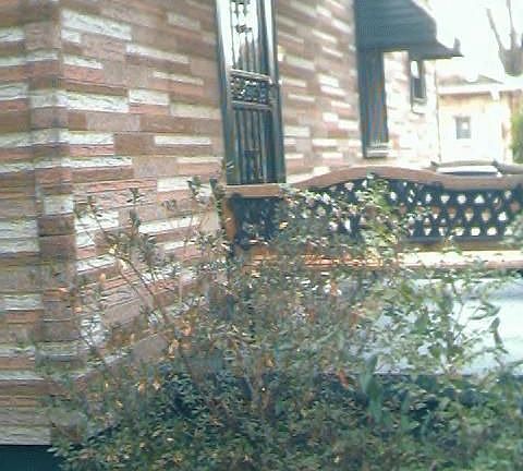 Nice porch with benches for relaxing on cool spring and summer days.