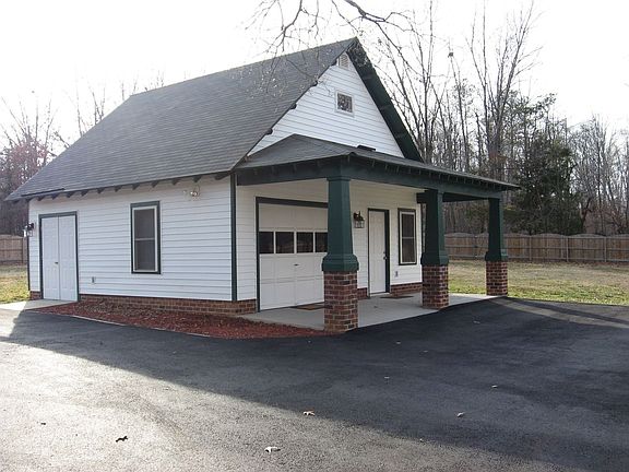 One car garage with two finished rooms, phone lines, cable, heat and a/c