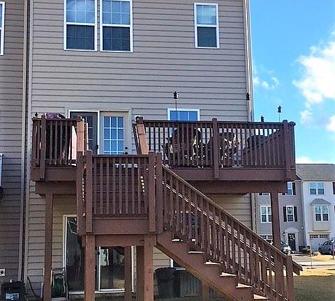 Back view - large deck with access to backyard