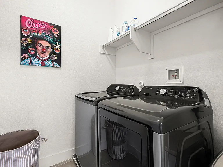 Conveniently located near all the bedrooms, the upstairs laundry room overlooks the second-floor patio and makes everyday living effortless.