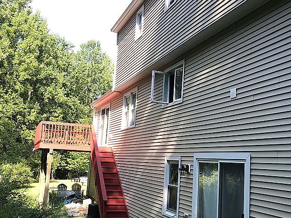 Large deck overlooking brook