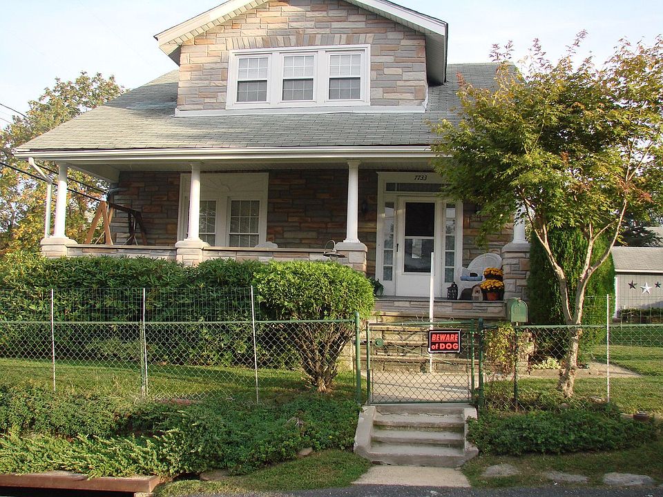 Large 1920's style with porch front
