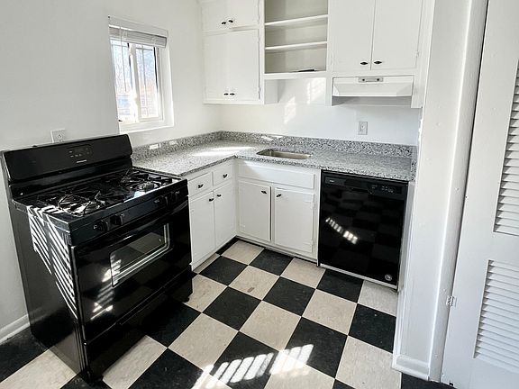 Updated kitchen with stone countertops!