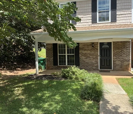 Private 1,512 s.f. end-unit with front and back porches. Completely renovated.