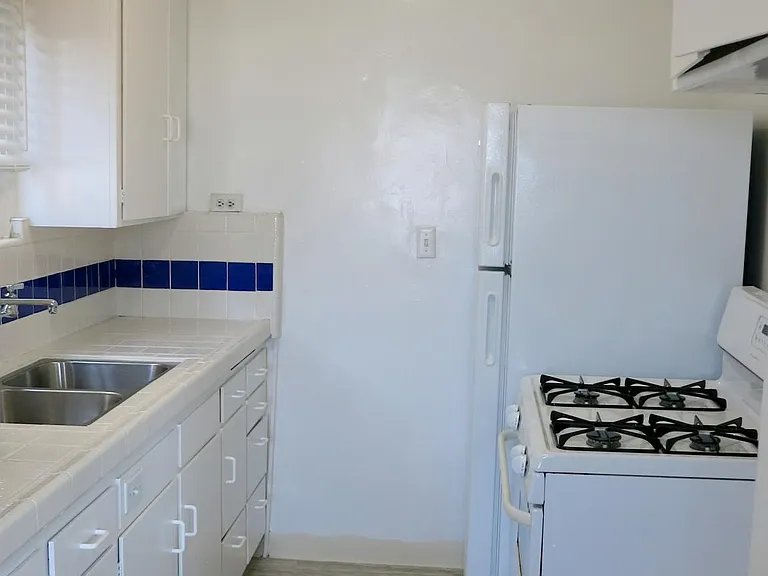 Newer refrigerator and stove.