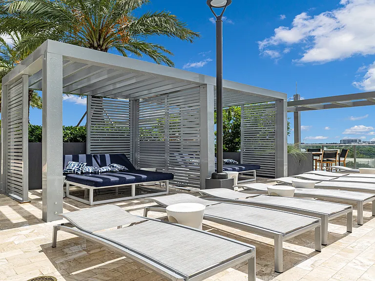 Need a little shade? Enjoy cabanas next to the pool!