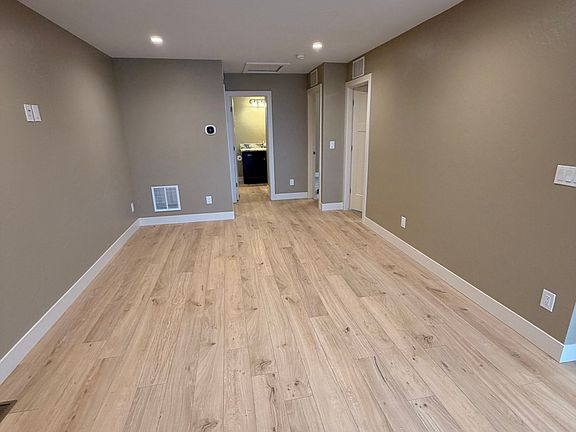 Living Room with thermostat for apartment temperature control