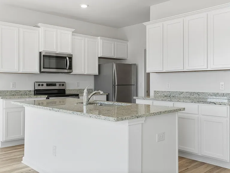 The kitchen features incredible counterspace.