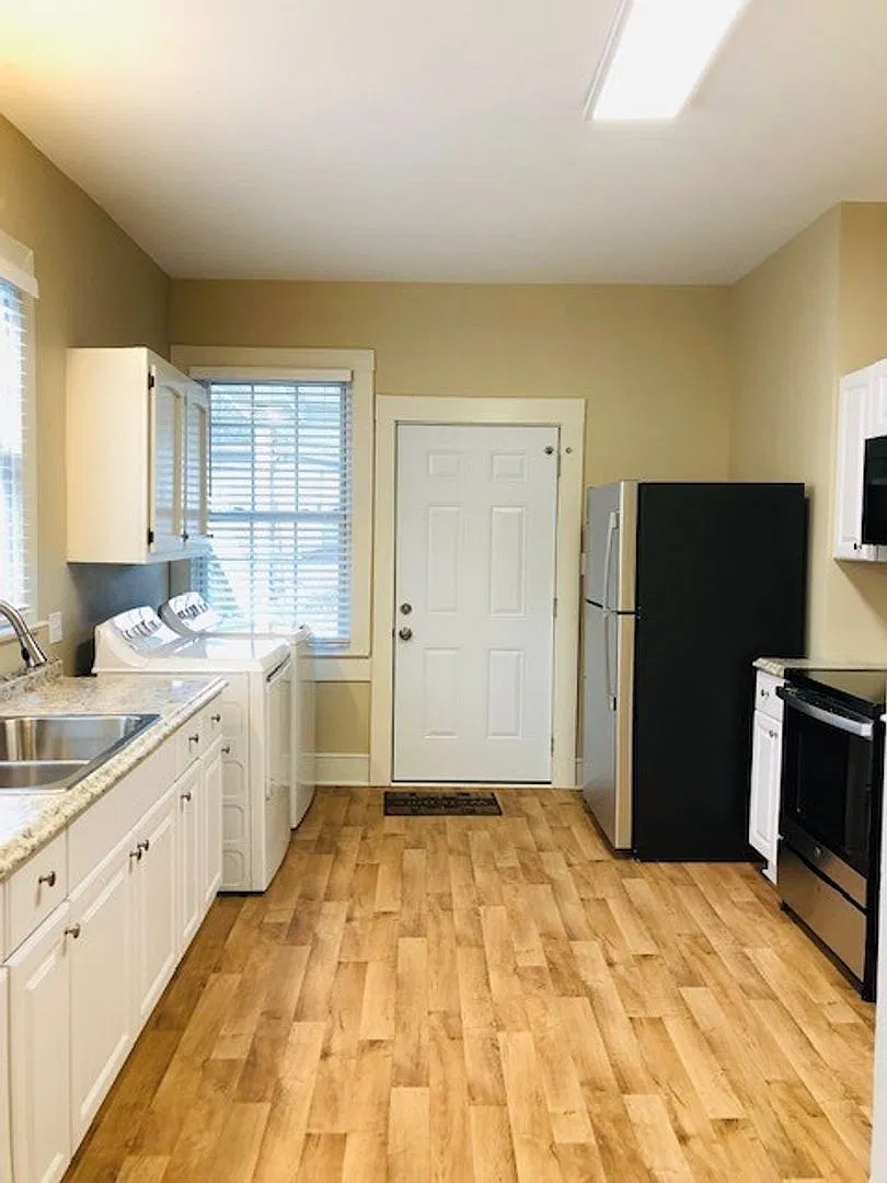 This cute Bungalow Home has nice size rooms, with hardwood floors, Heat/Air, 2 BD, 1 full BA, loc... — Photo 3