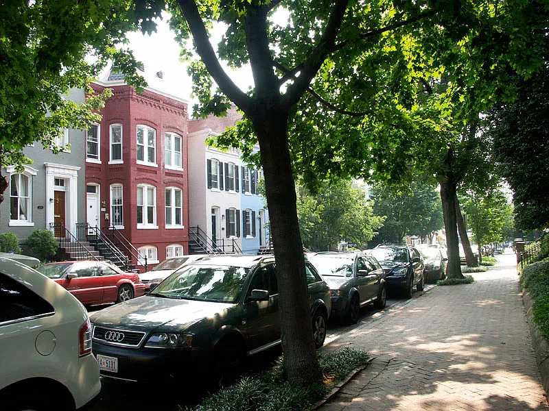 Red brick duplex on Dumbarton Street. The rental is the left half.