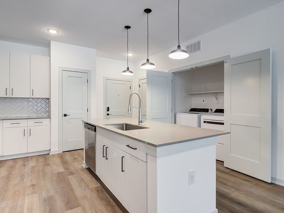 A stainless steel dishwasher, modern finishes, and full-size washer and dryer can be expected in every Garrett Forum apartment.