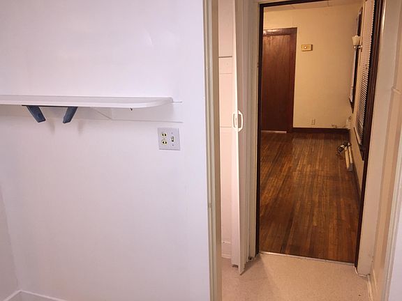 Kitchen looking into living room