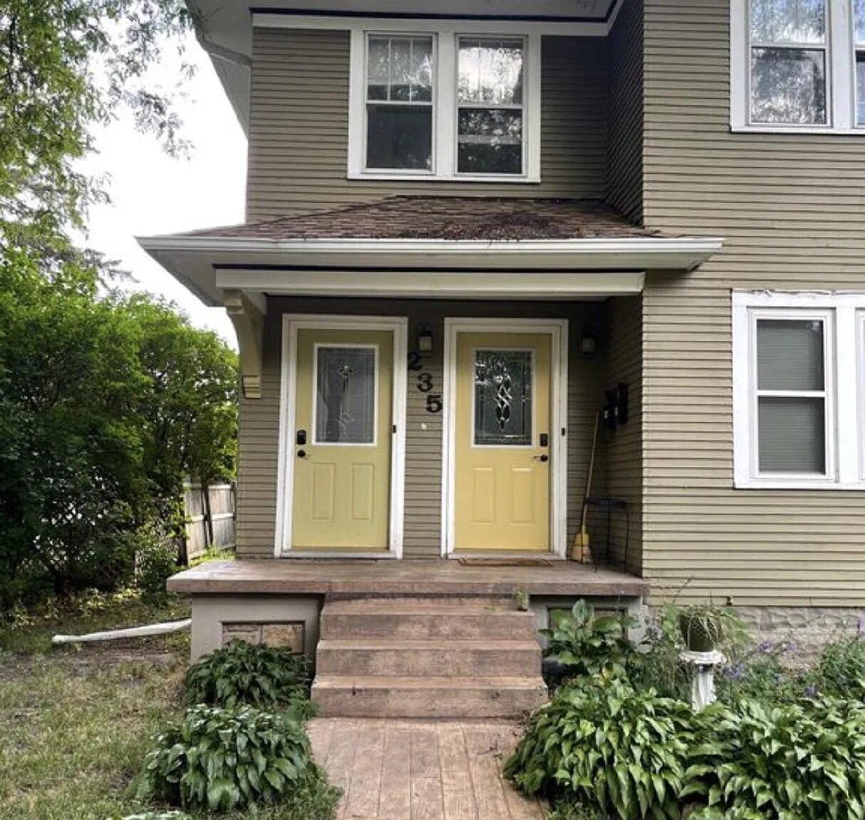 Upper level duplex 2-Bed Duplex with Gleaming Hardwood Floors at 235 Logan Ave N #2, Minneapolis!" — Photo 1