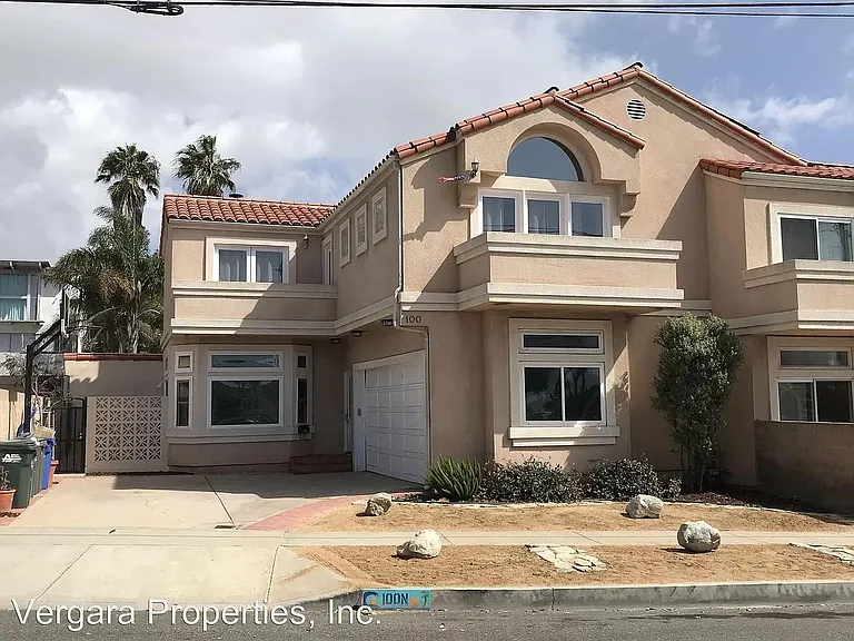 View of the outside of the house. This is a duplex house with only 1 shared wall and a wonderful, quiet neighbor. Landscaping is handled by the landlord. (Photo from before we moved in)
