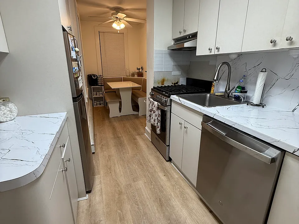 Kitchen view 1. Getting new ceiling, walls and upgraded cabinet cosmetics.