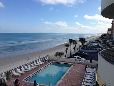Facing SE towards sunny pool
