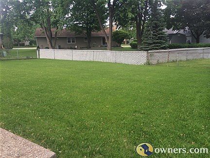 Wide open backyard, fully fenced.
