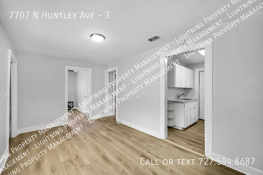 Building Photo - 7707 N Huntley Ave #3