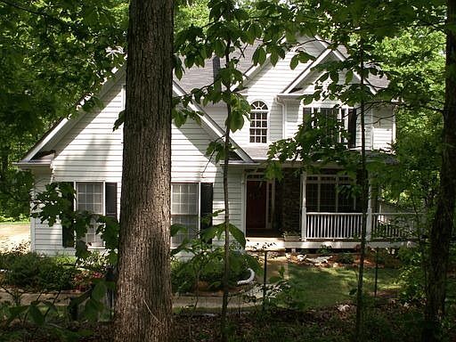 Beautiful North Forsyth County home with low taxes, great schools, & privacy!
