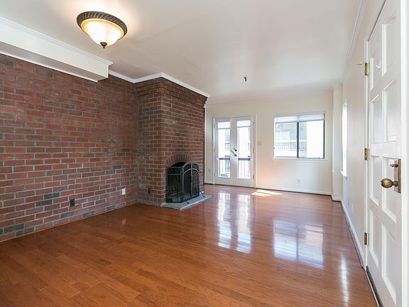 Living Room with Balcony and Patio