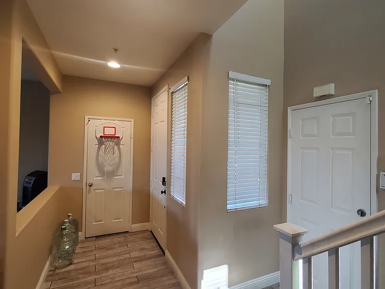 Foyer, Closet storage space, & Garage door