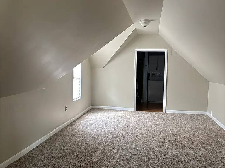 Main bedroom with attached bathroom and laundry suit, half bath