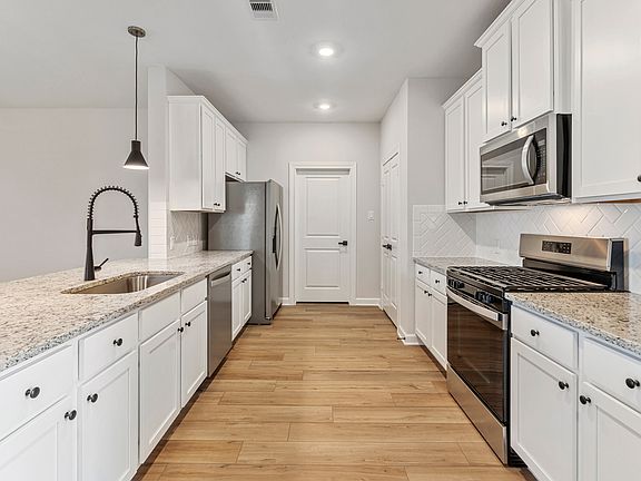 Stainless steel appliances are included