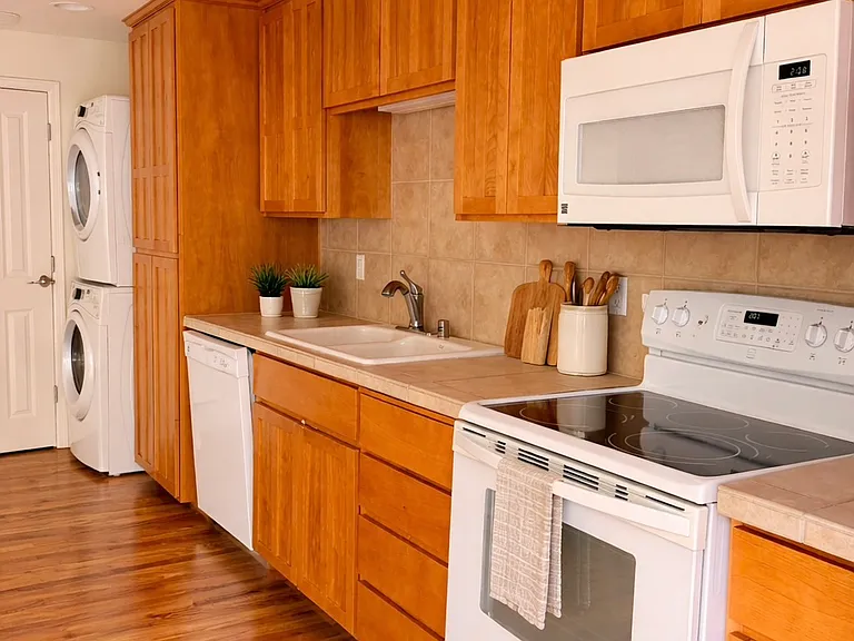 plenty of kitchen storage with pull out shelving in cabinetry