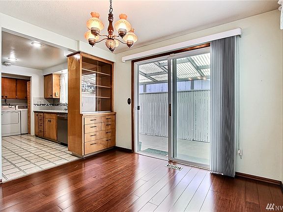 Fabulous formal dining room that opens out to patio & backyard!