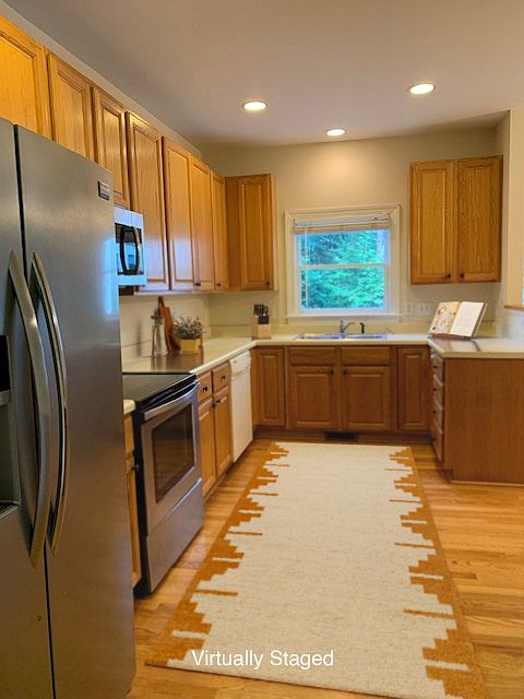 The kitchen has TONS of cabinet & counter space!