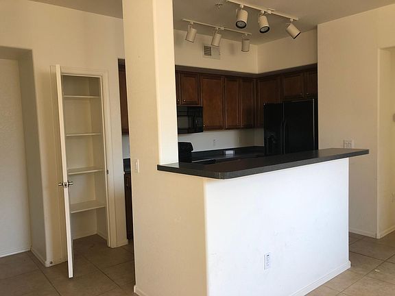 Island with sink, dishwasher with stool-high countertop