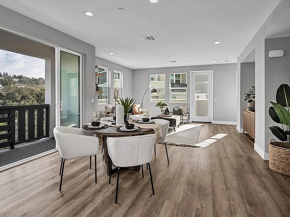 Dining room with private balcony and views