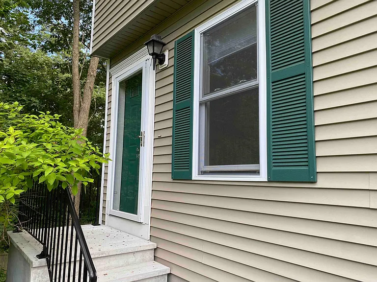 Three steps to front door, end unit