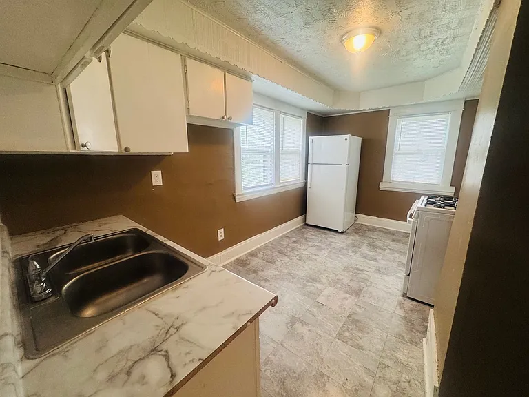 1056 E 99 ST. Cleveland, OH 44108 — Photo 22