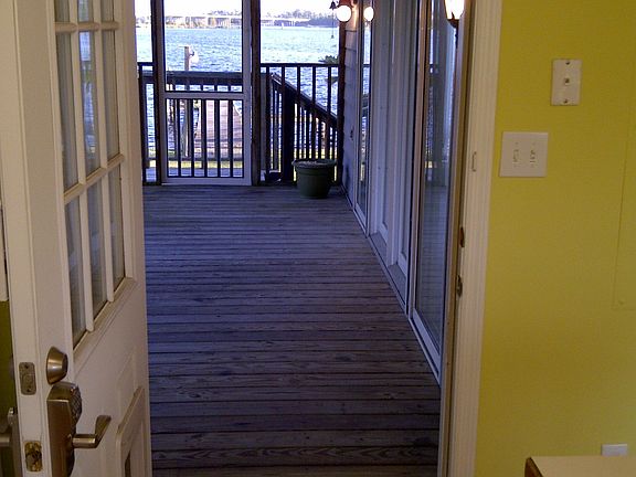 Screen Porch outside kitchen and living room