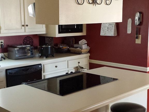 Kitchen with flat top stove