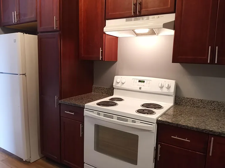 Granite Countertops, custom Thomasville cabinetry.