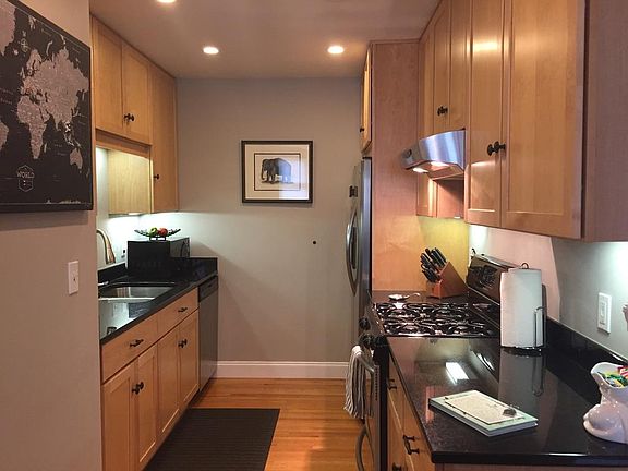 Full kitchen with stainless steel appliances