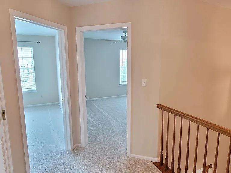 Doors to front bedrooms 1 and 2, right turn at the top of the stairs