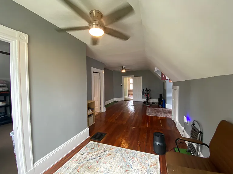 Third-floor bedroom with walk-in closet and en suite bath (13' x 27')
