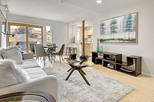 Open concept living room, dining room and kitchen.