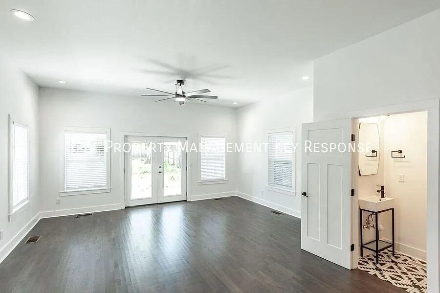 Modern 4-Bedroom Nashville Home with Flexible Living Space, Covered Patio & Downtown Access — Photo 4
