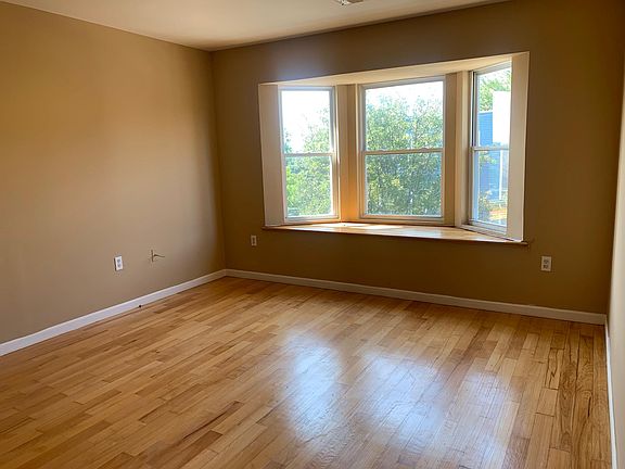 Sunlight living room with bay windows
