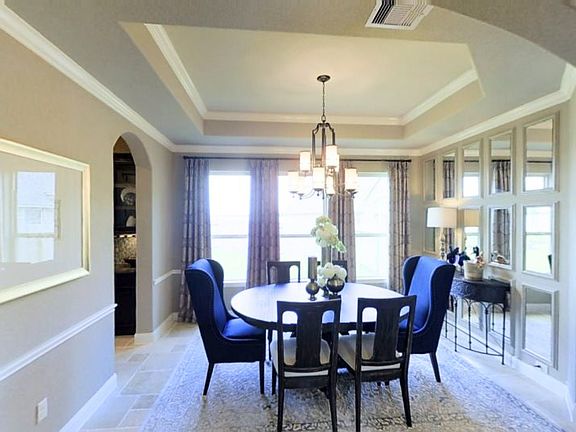 Set apart for added privacy, the formal dining room is perfect for meals or celebrations that call f
